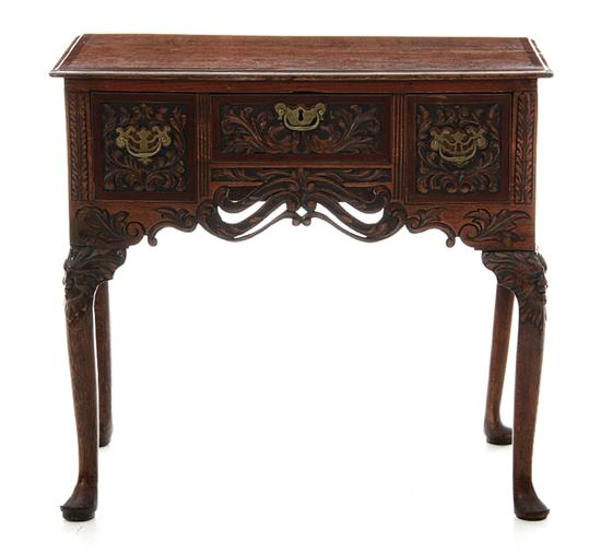 George III carved oak lowboy 19th