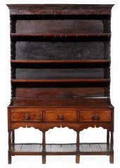 GEORGIAN-STYLE CARVED OAK WELS