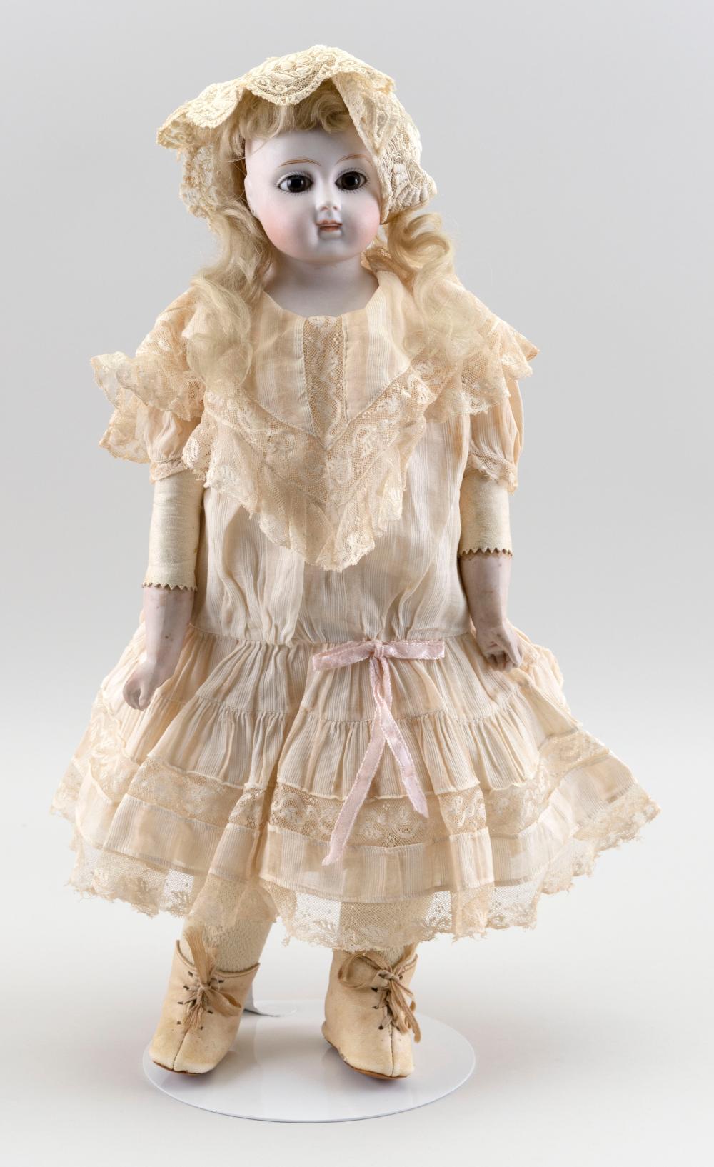 GERMAN BISQUE-HEAD DOLL CIRCA