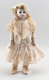 GERMAN BISQUE-HEAD DOLL CIRCA
