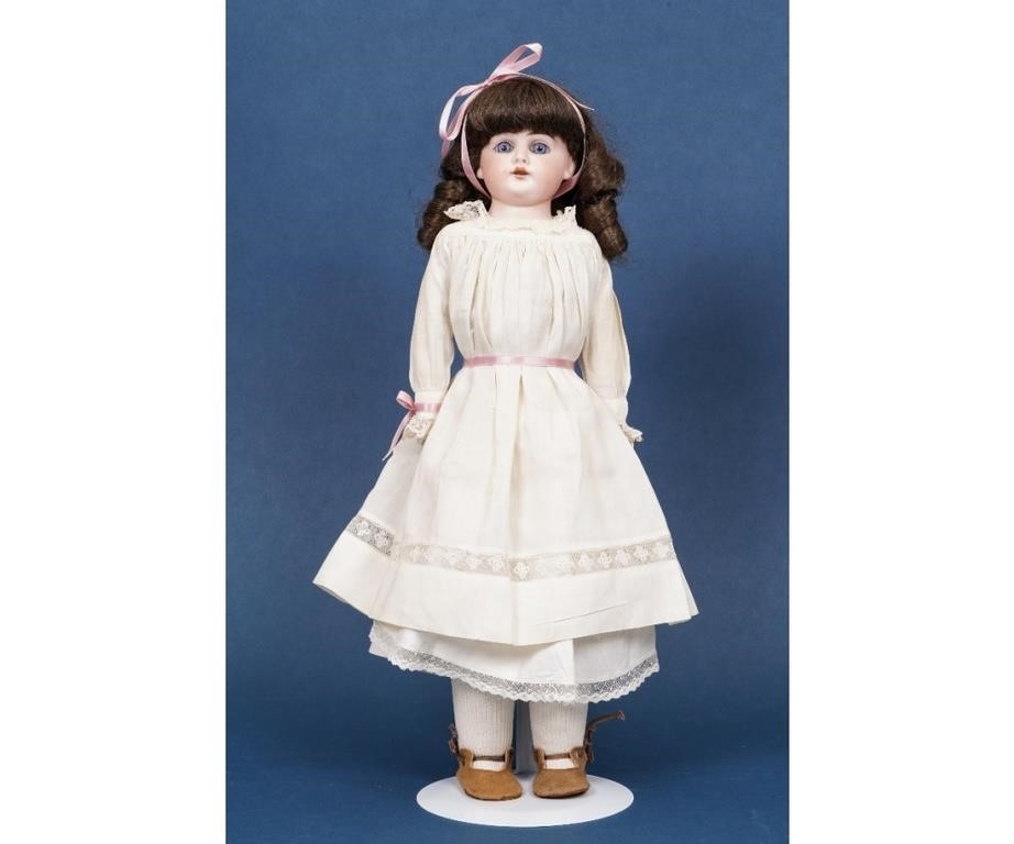 German bisque head doll with kid