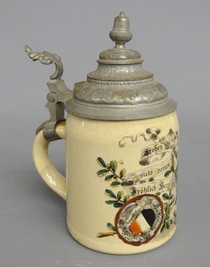 German stein decorated with man