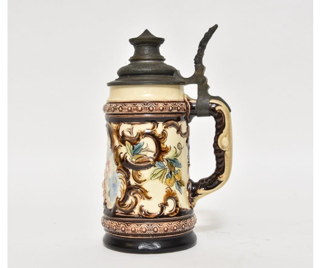 German stein with relief of