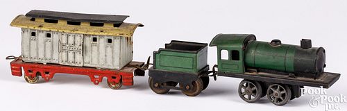 GERMAN TIN WIND-UP PENNY/NICKEL TOY