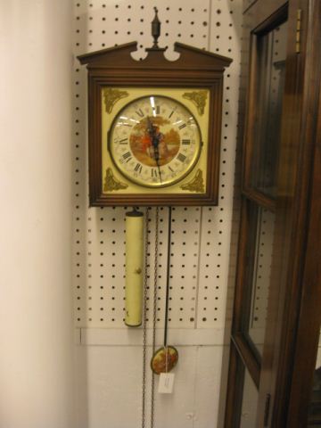 German Wall Clock courting scenes.