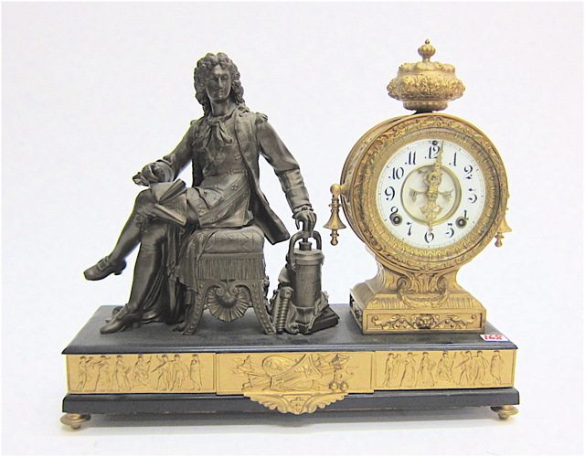 GILDED AND BRONZED METAL STATUE