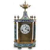 GILDED BRASS AND CLOISONNE MAN