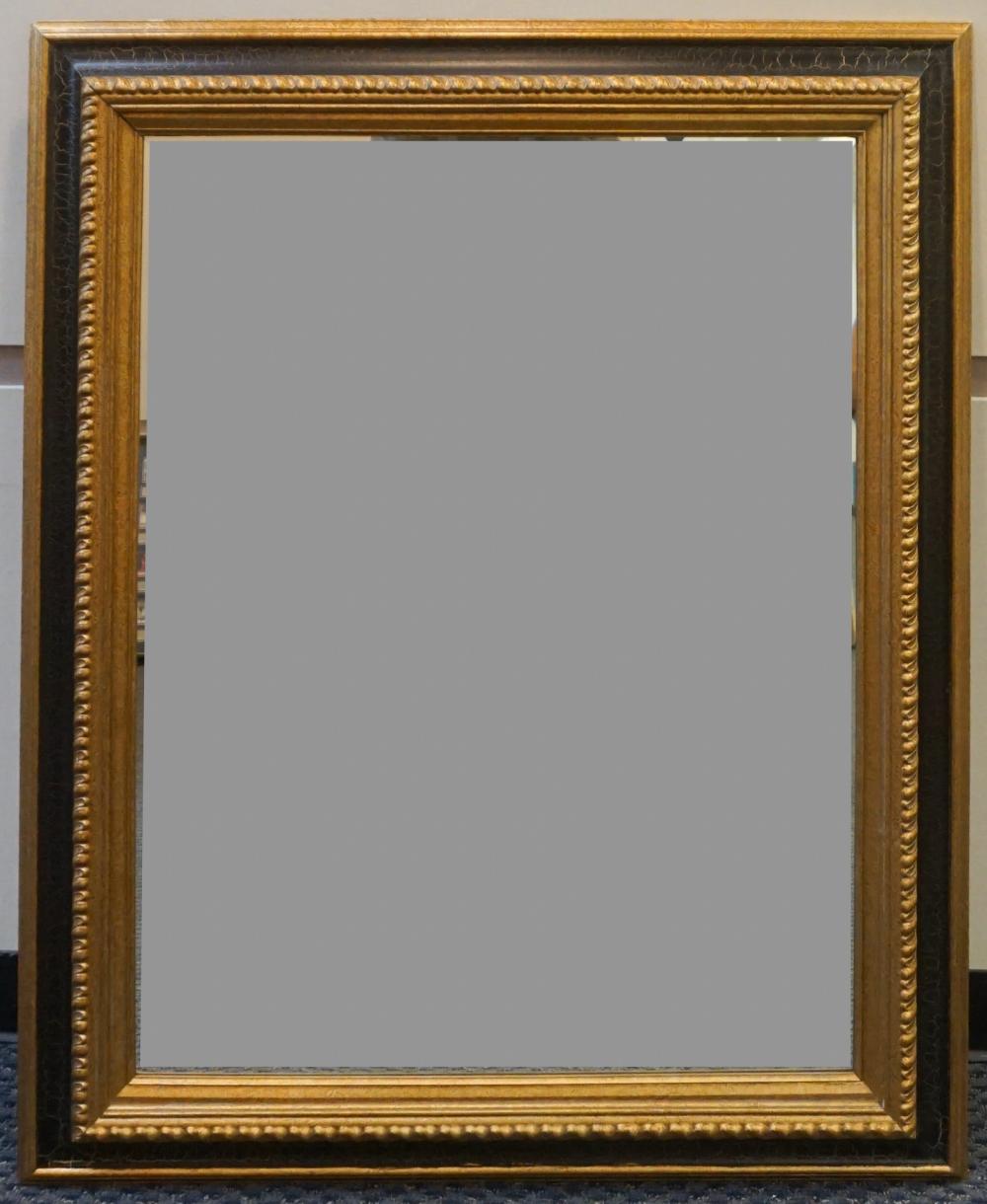 GILT AND EBONIZED BEVEL EDGE MIRROR