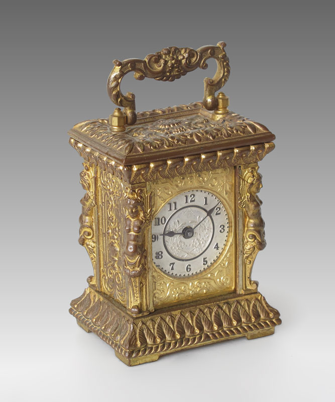 GILT ANSONIA COMET FIGURAL CARRIAGE