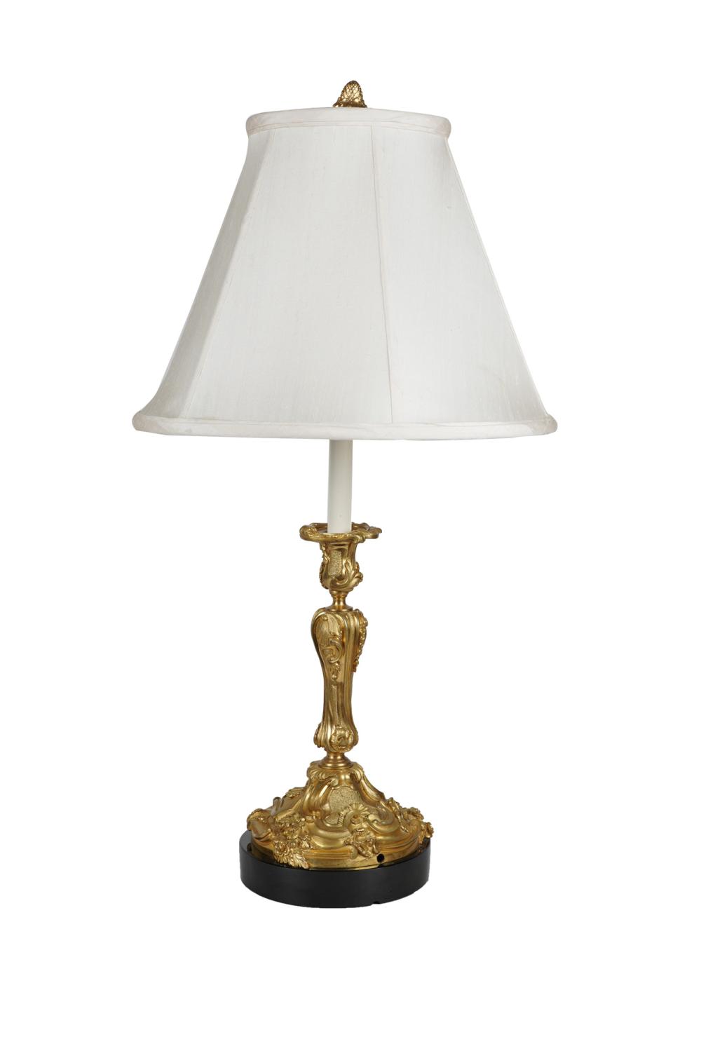 GILT BRONZE CANDLESTICK LAMPon a