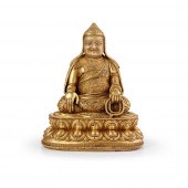 GILT BRONZE FIGURE OF A GELUGP