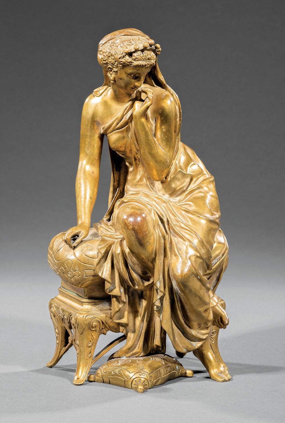 GILT BRONZE FIGURE OF A MAIDEN