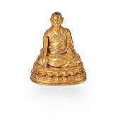 GILT-BRONZE FIGURE OF A LAMA ?