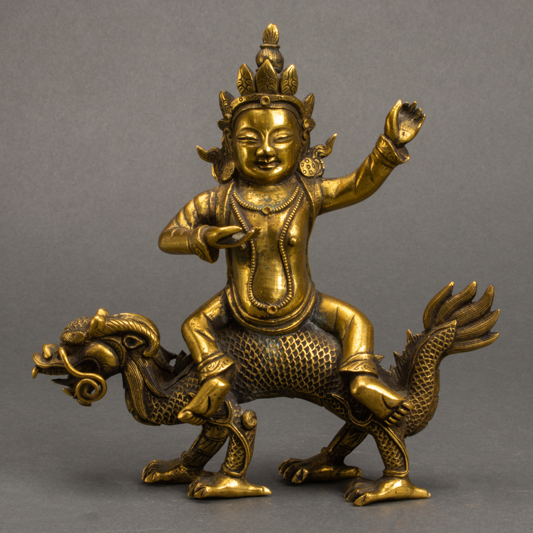 GILT BRONZE FIGURE OF JAMBHALA Gilt