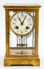 GILT BRONZE FOUR GLASS CLOCK,