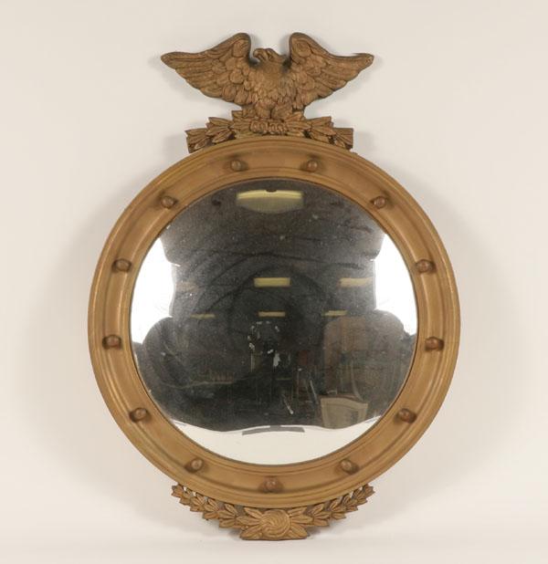 Gilt bullseye mirror with bird