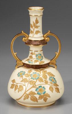 Gilt decorated ceramic ewer, raised