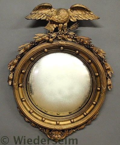 Gilt decorated girandole mirror
