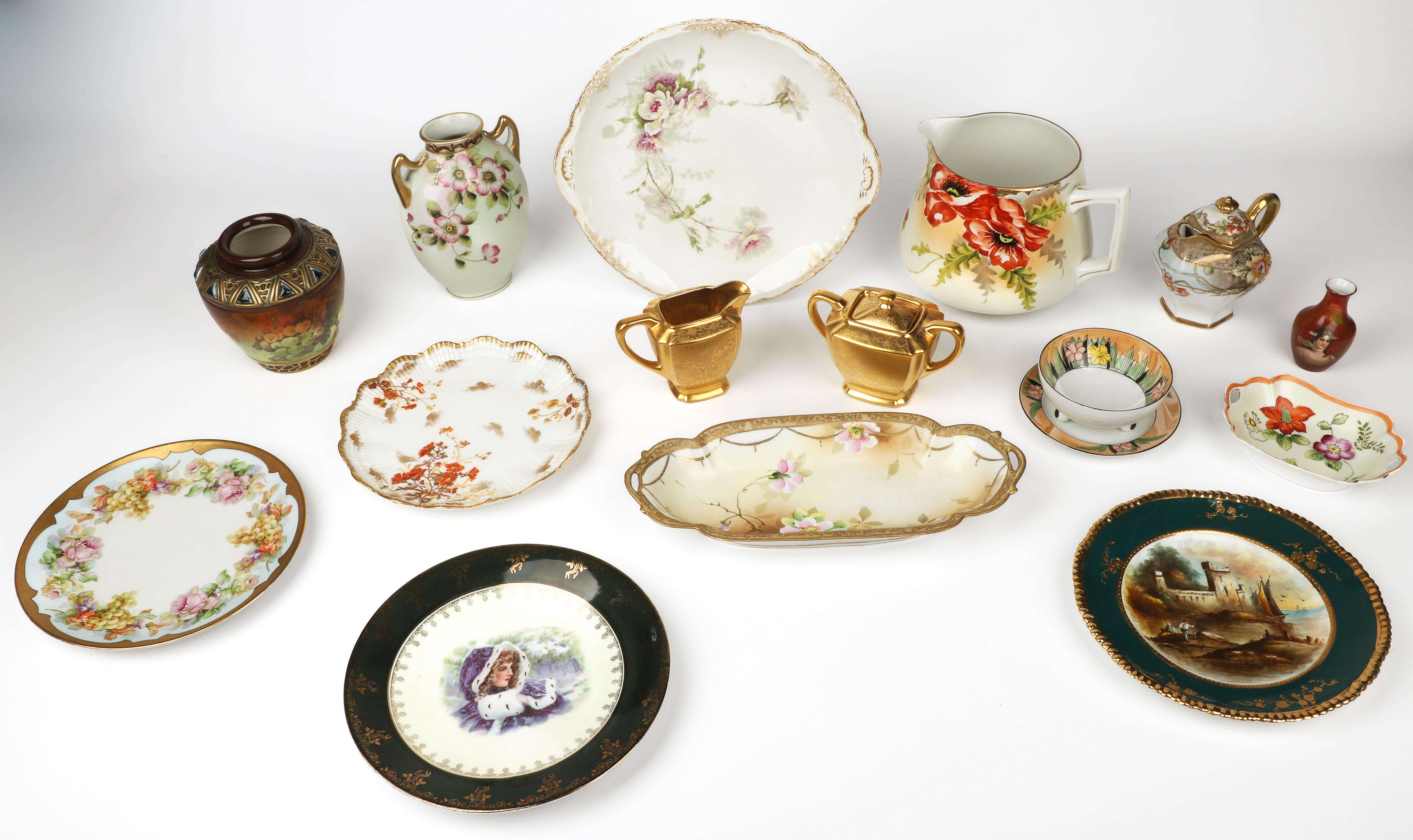 Gilt decorated porcelain grouping