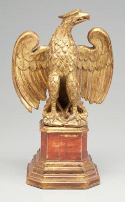 Gilt eagle on stand, carved and