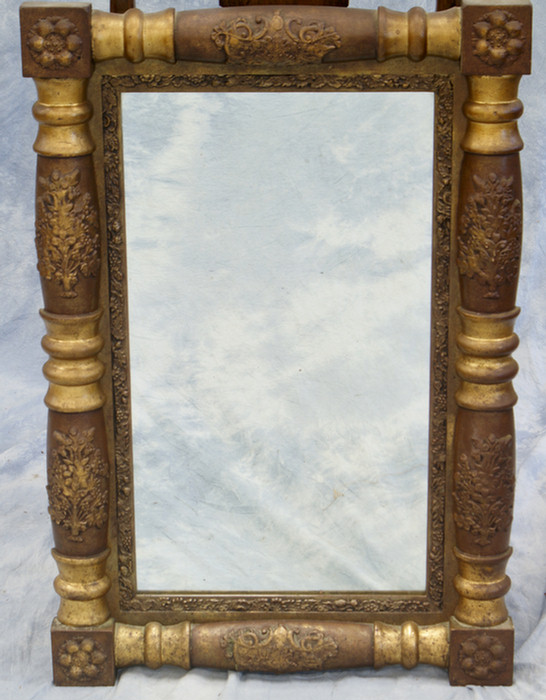 Gilt half spindle Empire mirror,