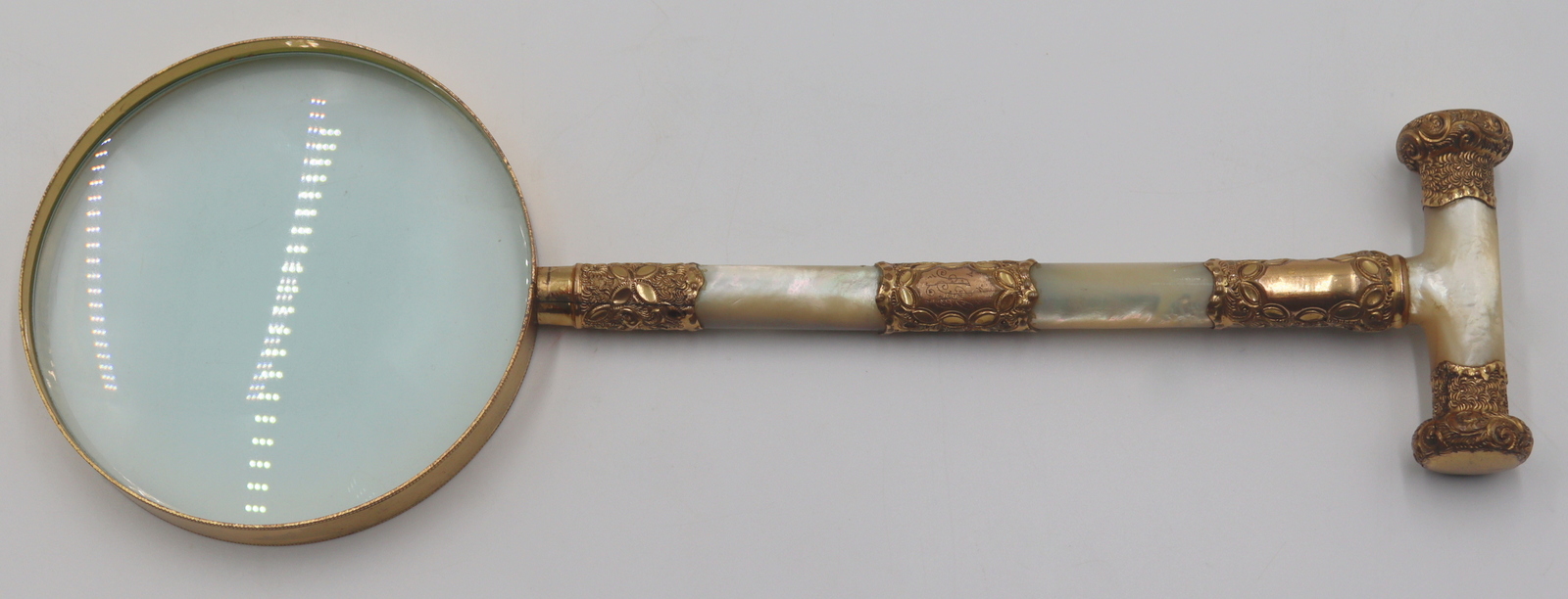 GILT METAL AND MOTHER-OF-PEARL