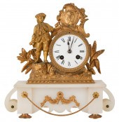 GILT METAL AND WHITE STONE FIG