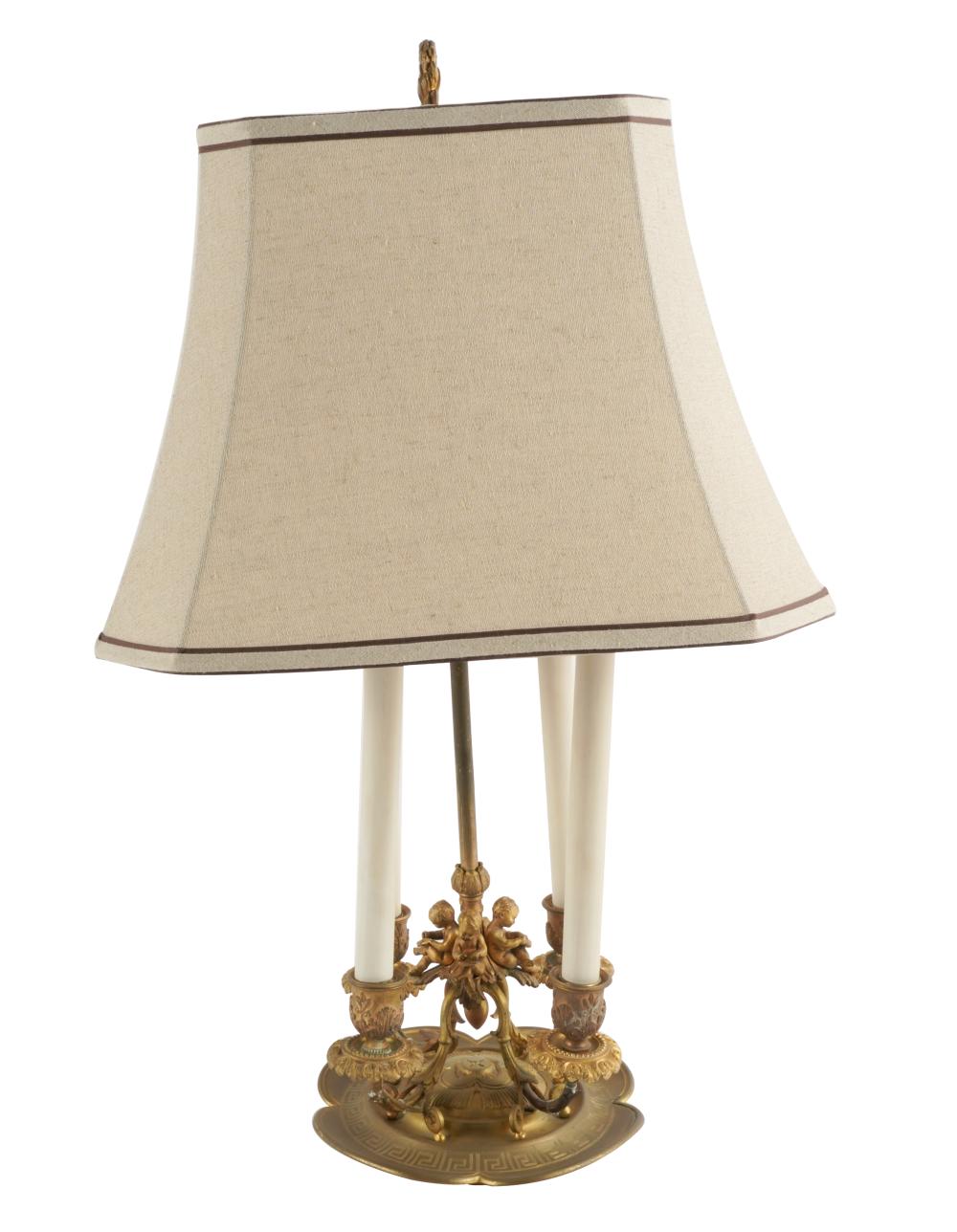 GILT METAL FIGURAL CANDLESTICK