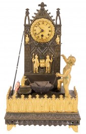 GILT METAL FIGURAL MANTEL CLOC