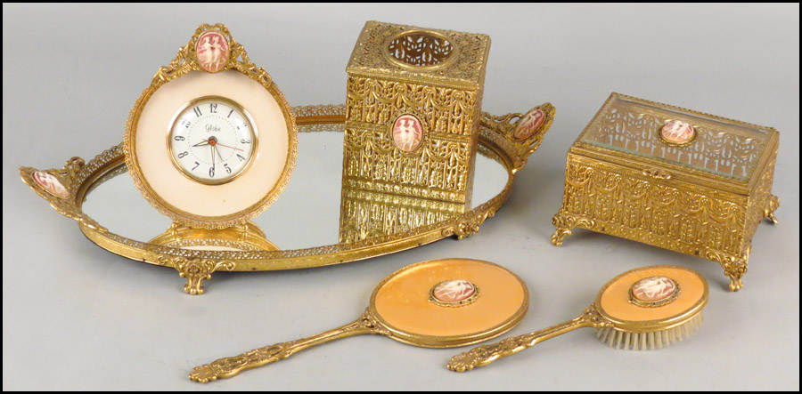 GILT METAL VANITY SET. Comprising a