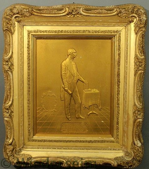 Gilt plaster relief figure of