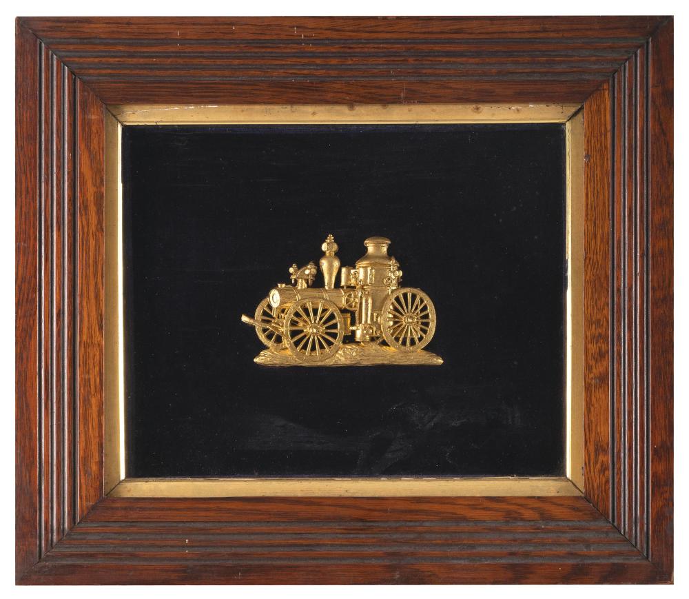 GILT RELIEF PLAQUE OF AN AMOSKEAG