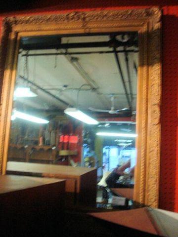 Giltwood & Beveled Glass Mirror.