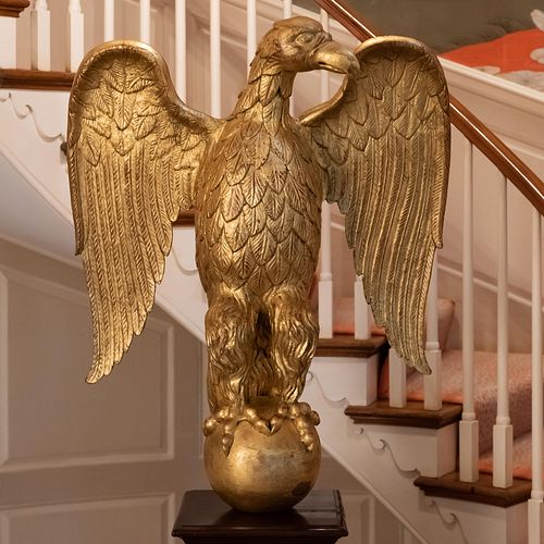 GILTWOOD FIGURE OF AN EAGLE ON A