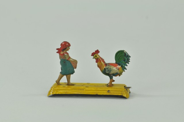GIRL FEEDING CHICKEN MECHANICAL