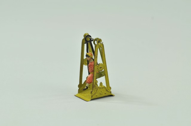 GIRL IN SWING PENNY TOY Distler