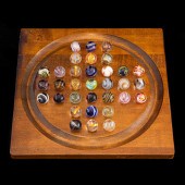 GLASS AND WOOD MARBLE SOLITAIR