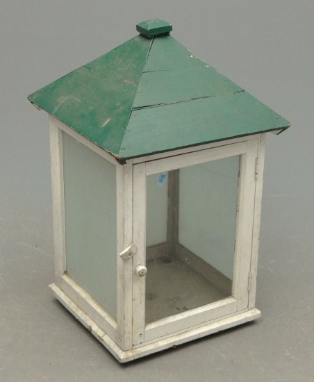 Glass and wood painted cabinet.