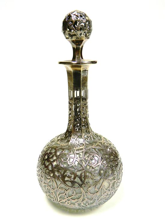 Glass decanter with elaborate