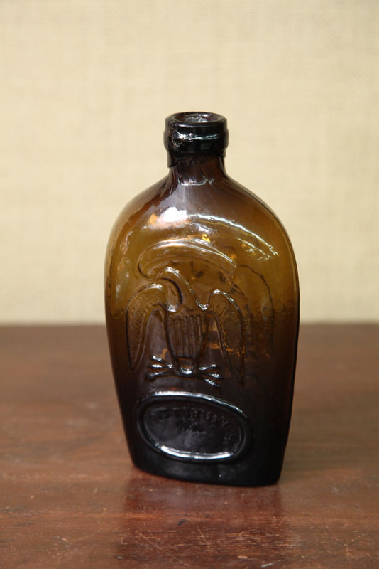 GLASS FLASK. Golden amber