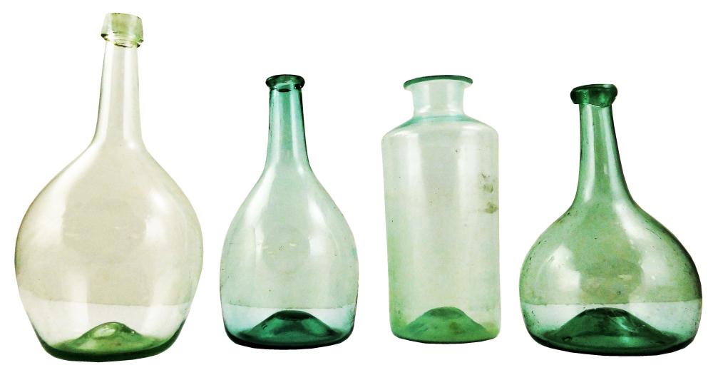 GLASS: FOUR PALE GREEN BOTTLES,