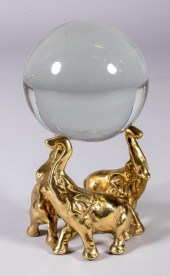 GLASS SPHERE SUPPORTED BY THE