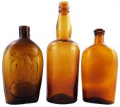 GLASS: THREE AMBER-COLORED GLA
