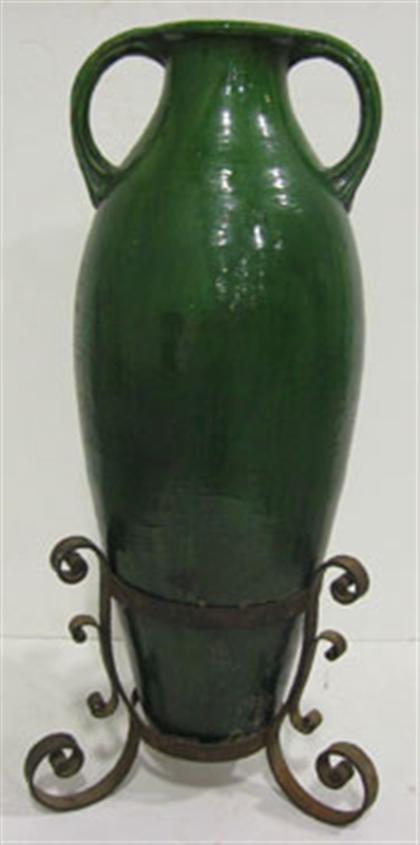 Glazed earthenware and wrought iron