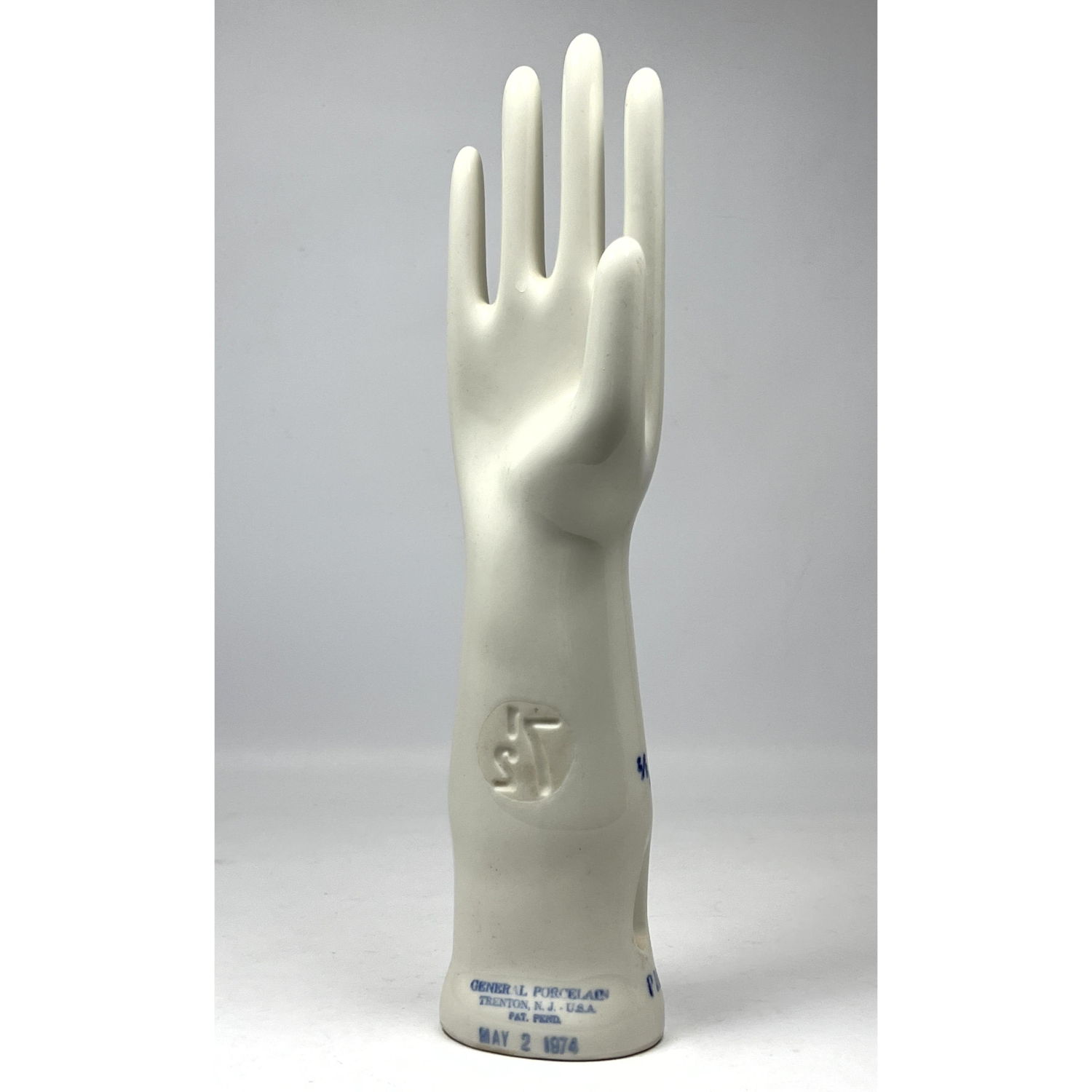Glazed Porcelain Glove Mold.