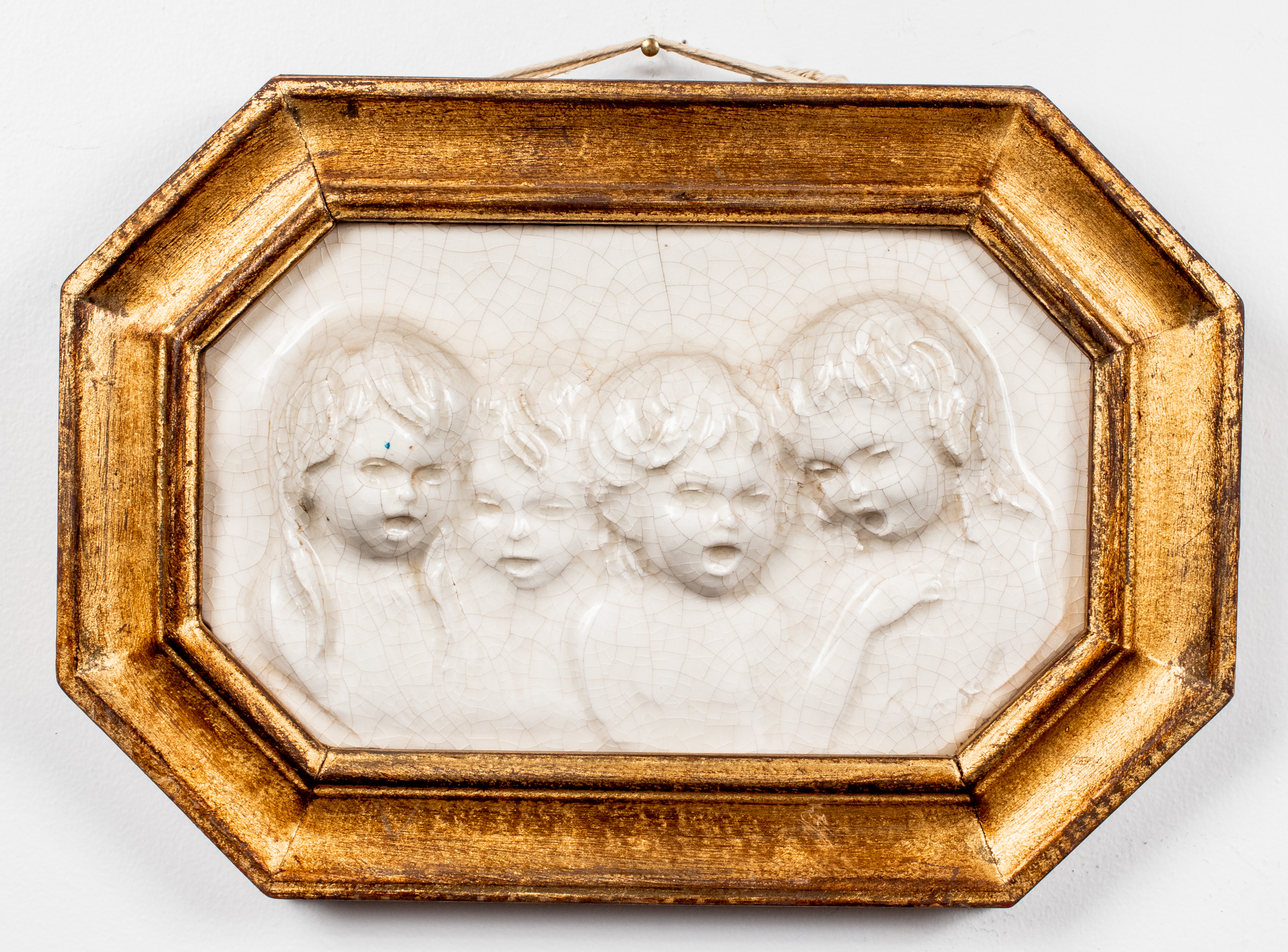 GLAZED PORCELAIN RELIEF PLAQUE OF