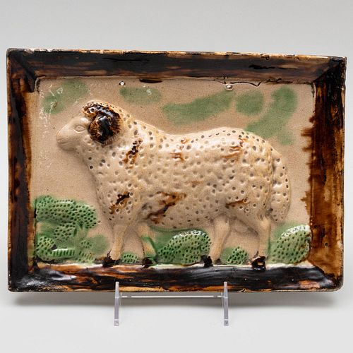 GLAZED POTTERY PLAQUE OF A RAM,