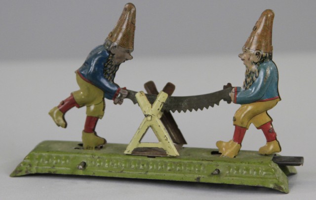 GNOMES SAWING WOOD PENNY TOY