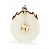 GOLD AND CARVED JADE BI DISC P