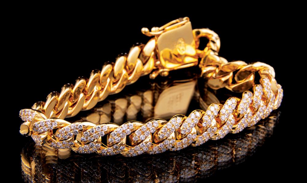 GOLD AND DIAMOND CURB CHAIN